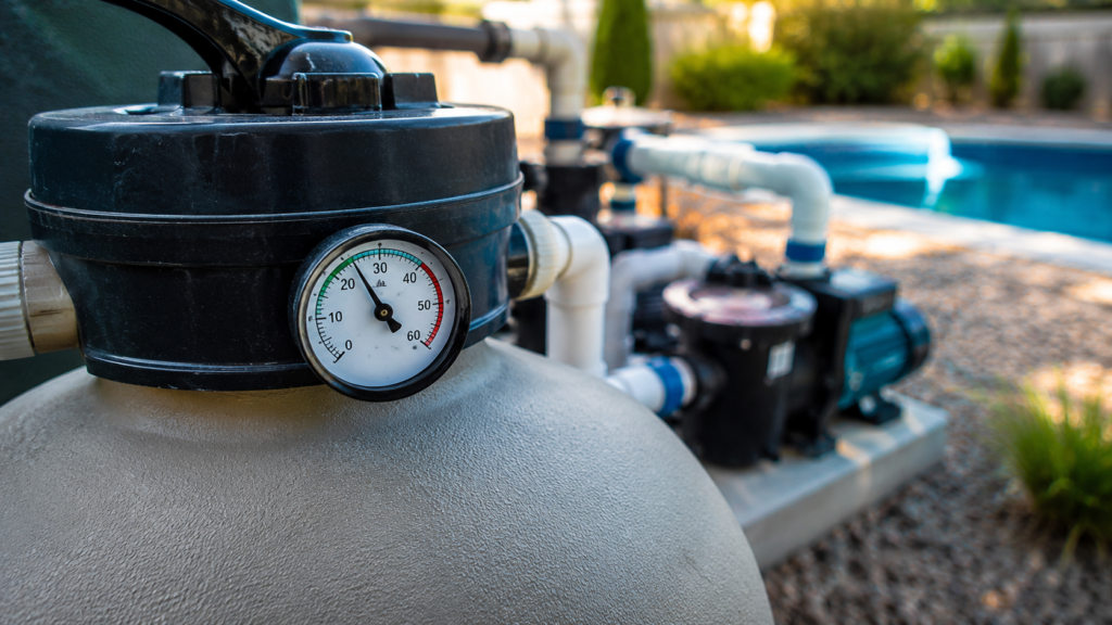 Pressure gauge on a residential sand filter showing when to backwash during green pool cleanup
